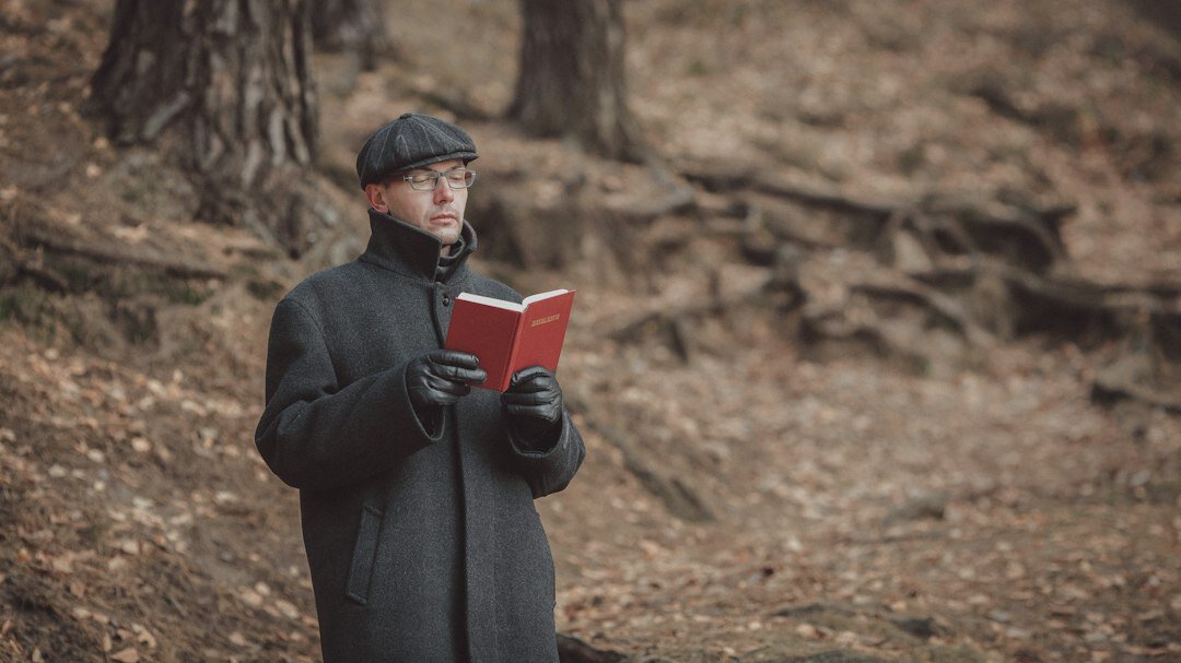 detective reading mystery book